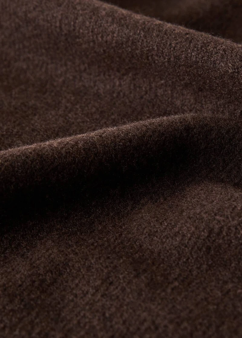 Wool-blend blanket with fringes