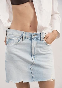 Denim skirt with frayed hem
