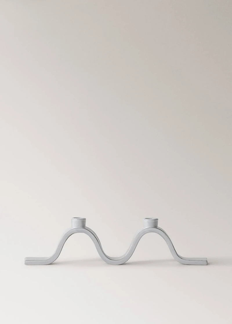 Stoneware candlestick with wave design and glossy finish