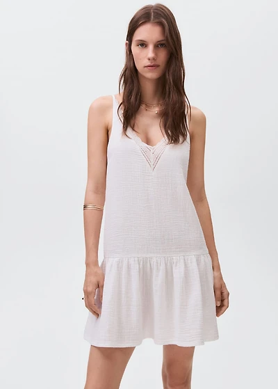 Dress with lace flounces