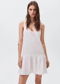 Dress with lace flounces