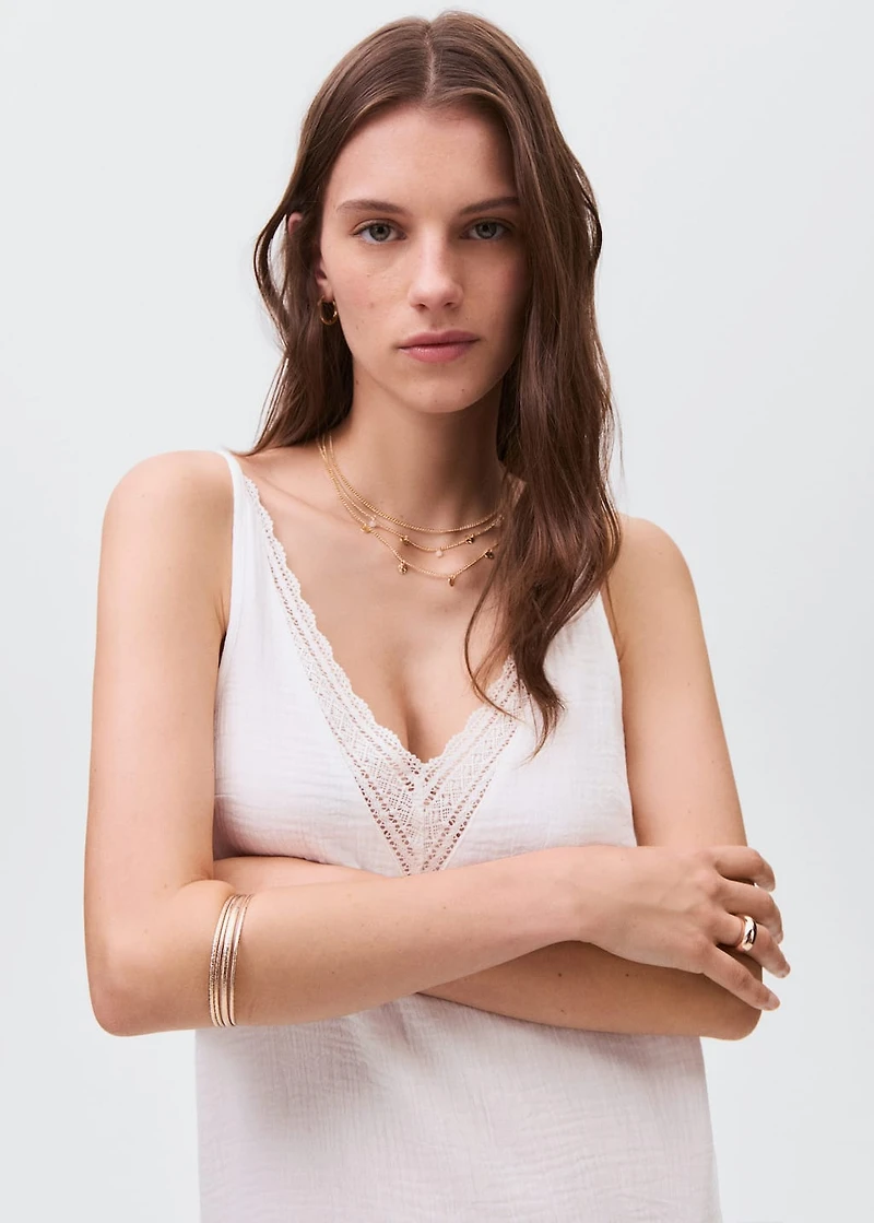 Dress with lace flounces