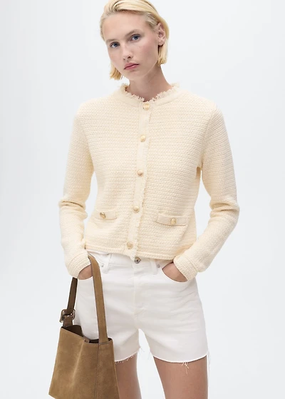 Knitted cardigan with frayed ends