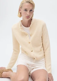 Knitted cardigan with frayed ends