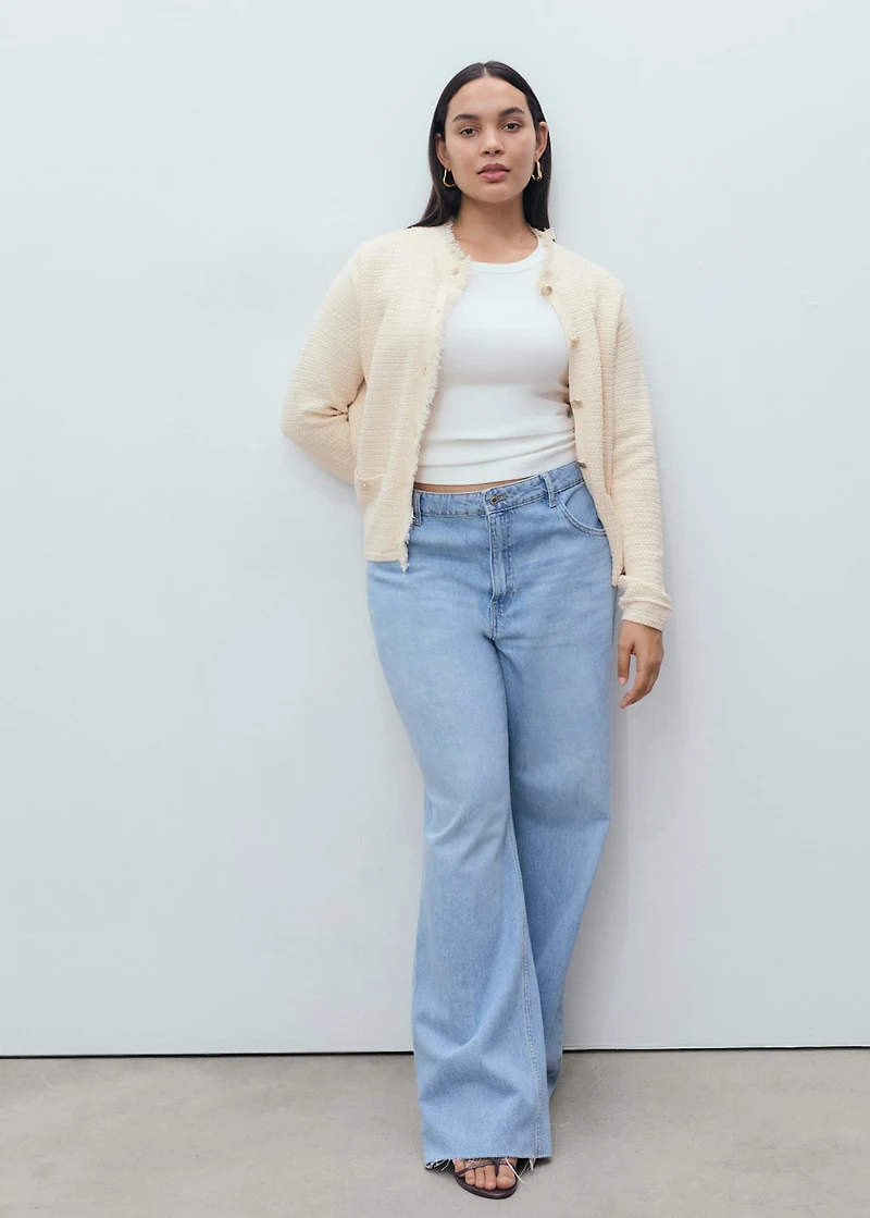 Knitted cardigan with frayed ends
