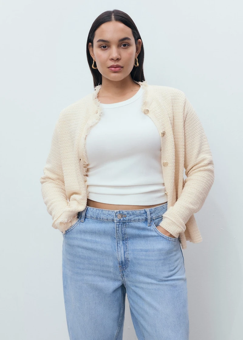 Knitted cardigan with frayed ends