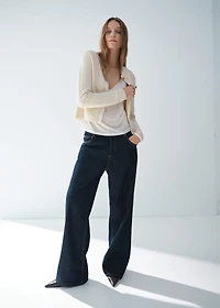 Knitted cardigan with frayed ends
