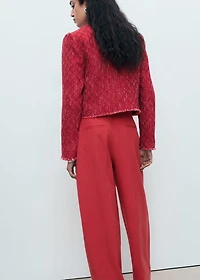 Tweed jacket with frayed ends
