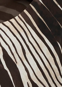 Zebra-print dress with flared sleeves