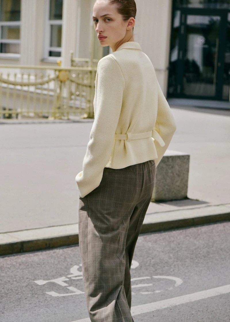 Knitted jacket with belt and buckle