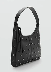 Studded clutch bag