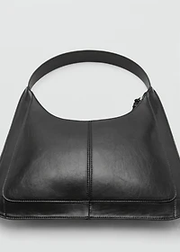 Studded clutch bag