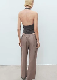 Halter top with metallic appliqués