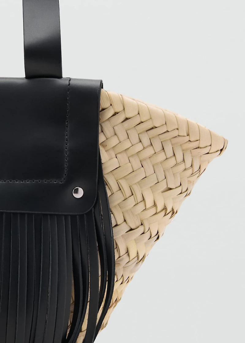 Small natural fiber basket with leather fringes