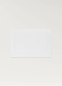 Embroidered hemstitched linen placemat