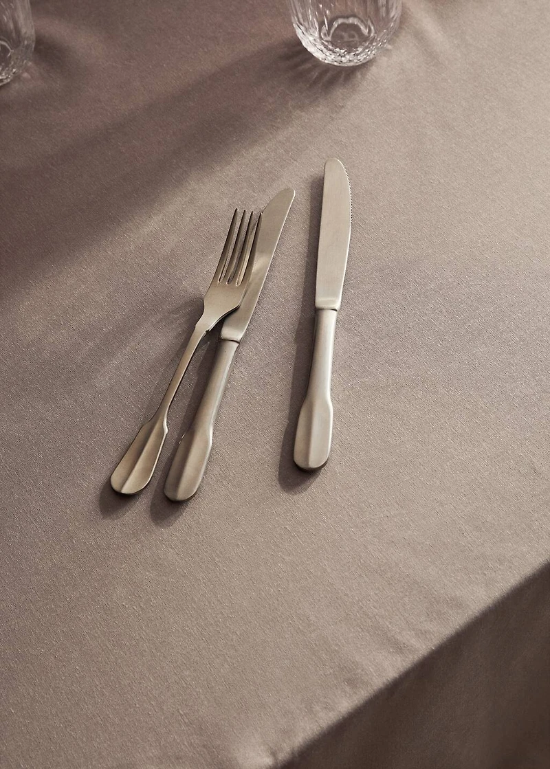 Resin-coated cotton tablecloth with overlock stitching for 8 to 10 diners