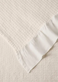 Jacquard cotton bedspread with ruffle for mini cot