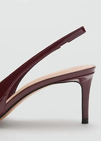 Patent heeled shoes