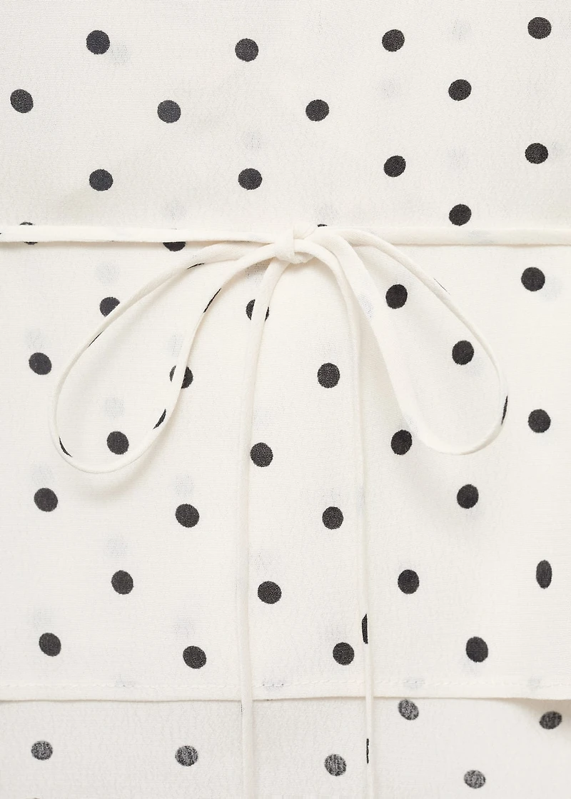 Polka-dot blouse with ruffles