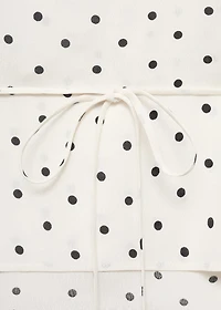 Polka-dot blouse with ruffles