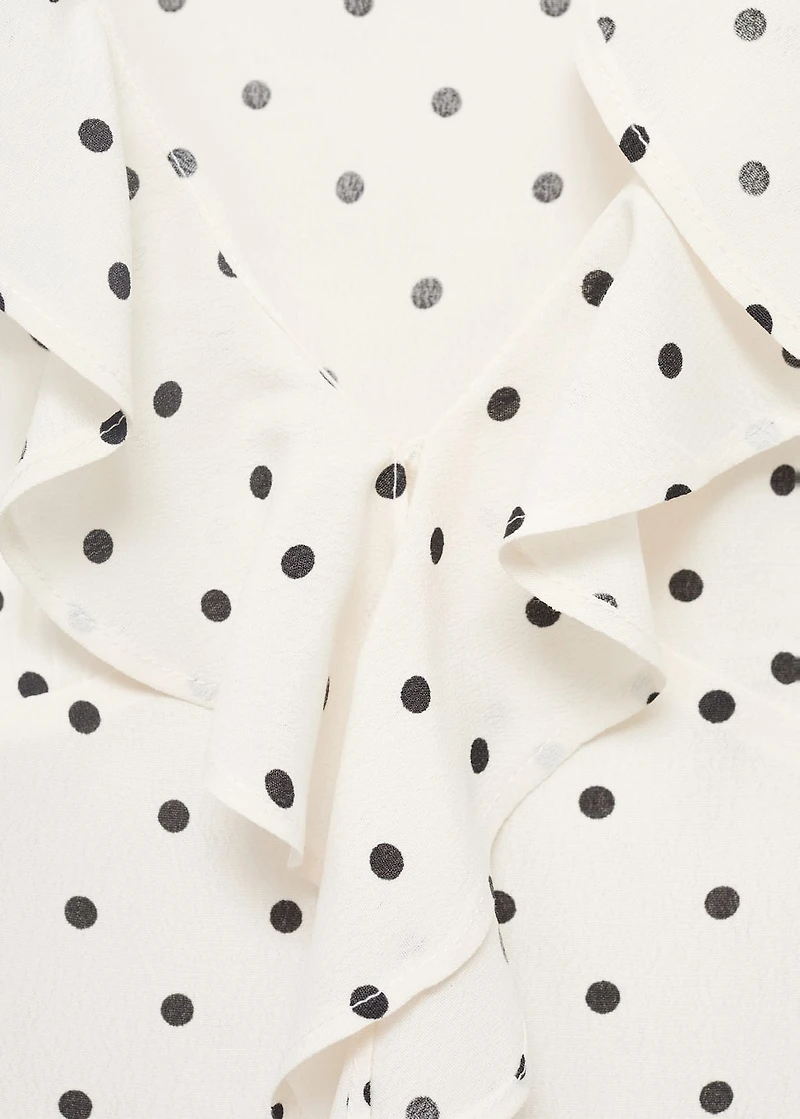 Polka-dot blouse with ruffles