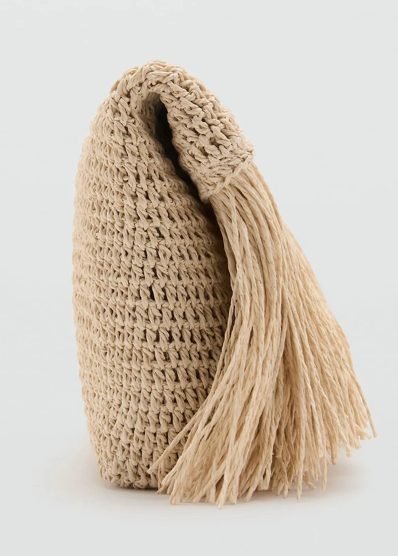 Natural fiber handbag with fringes