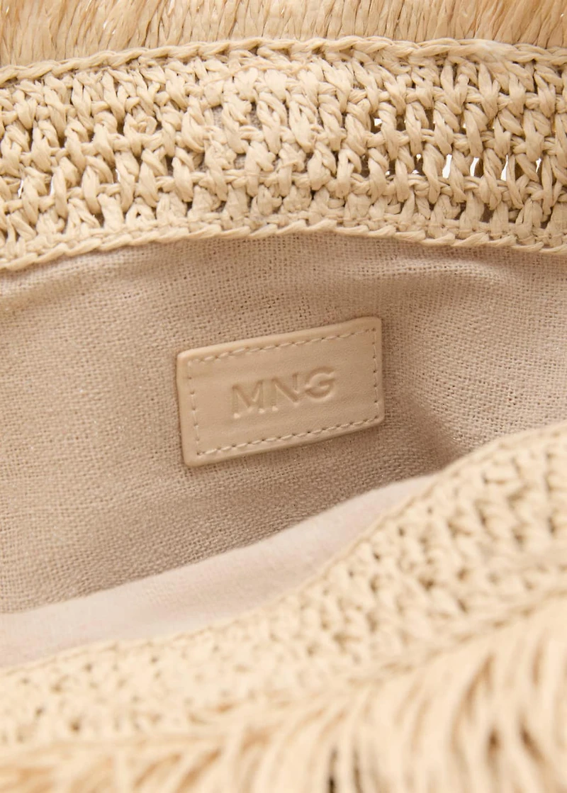 Natural fiber handbag with fringes