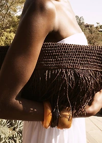 Natural fiber handbag with fringes