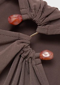 Frilly top with jewel detail