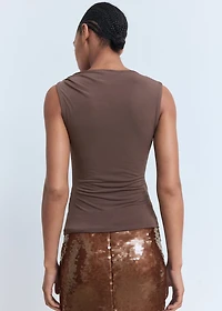 Frilly top with jewel detail