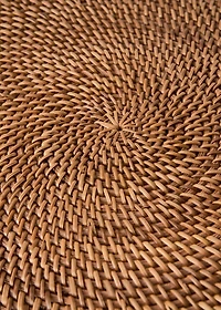 Round rattan placemat