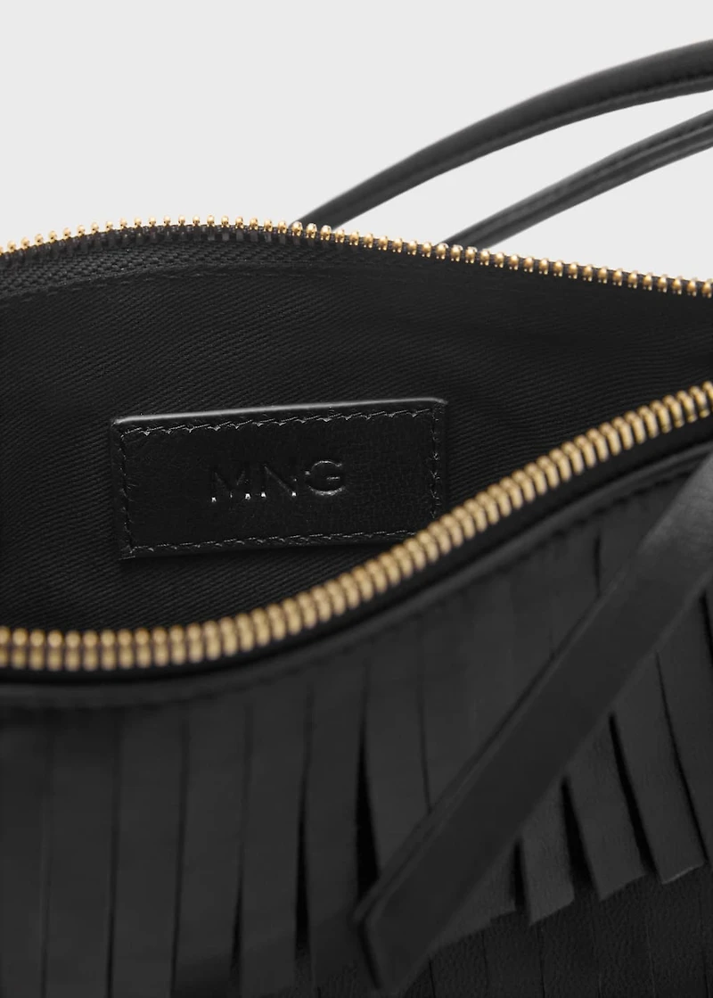 Leather shoulder bag with fringes