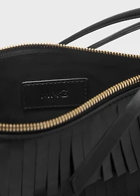 Leather shoulder bag with fringes
