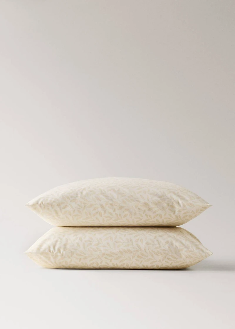 Two 60x60 cm percale cotton pillowcases with leaf pattern