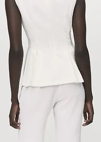 Peplum top with pleat detail