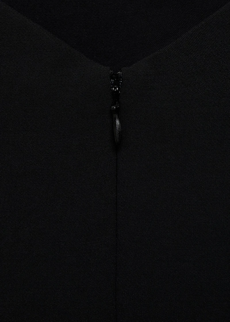 Long jumpsuit with asymmetrical neck