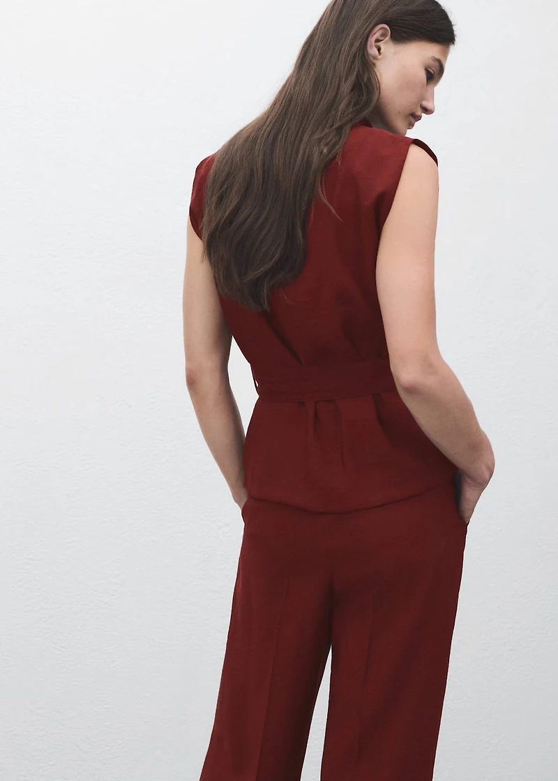 Blouse with draped neck and belt