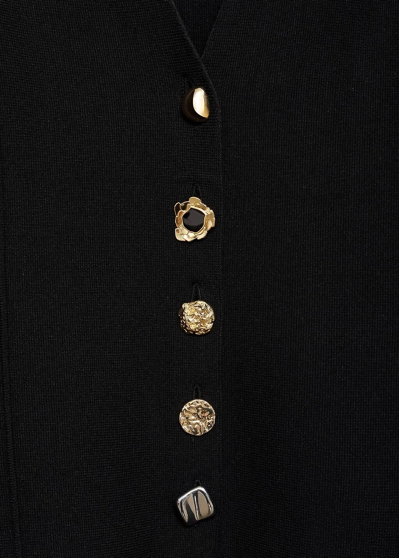 Knitted jacket with jewel buttons