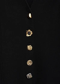 Knitted jacket with jewel buttons