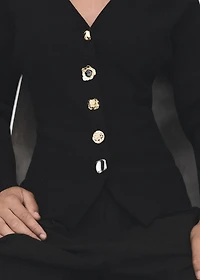 Knitted jacket with jewel buttons