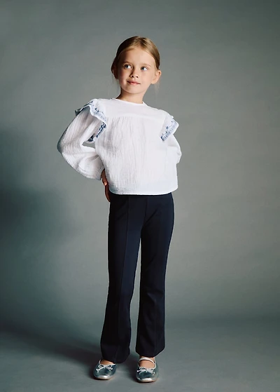 Ruffled embroidered blouse