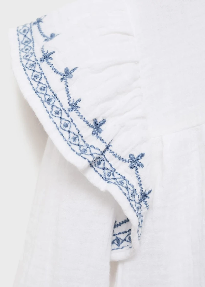 Ruffled embroidered blouse