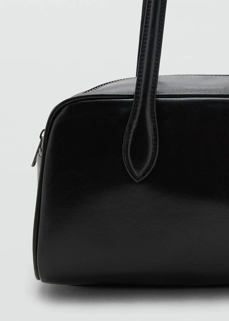 Bowling bag with leather-effect finish