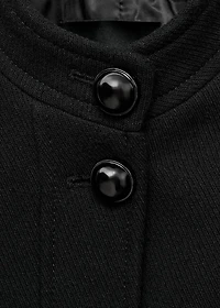 Jacket with jewel-button strip collar