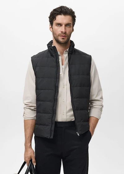 Quilted vest with down and feather filling