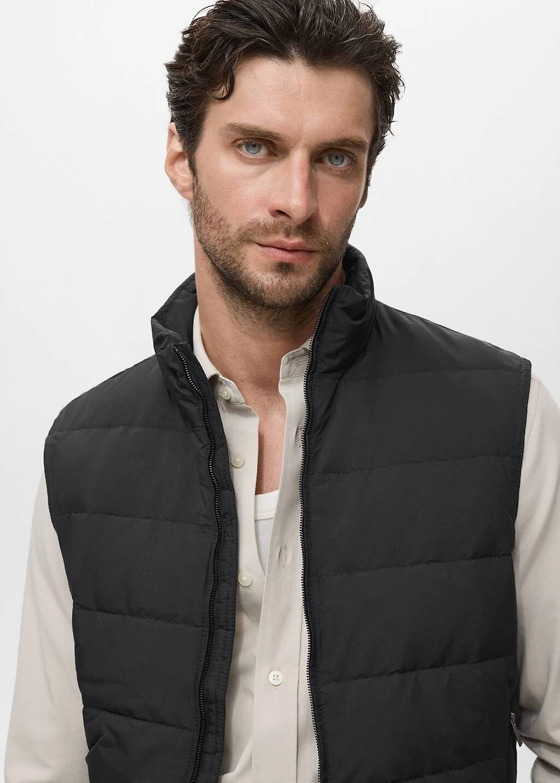 Quilted vest with down and feather filling
