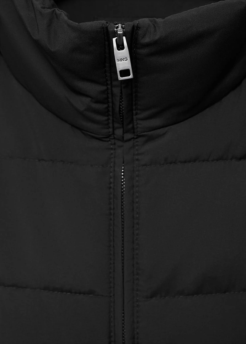 Quilted vest with down and feather filling