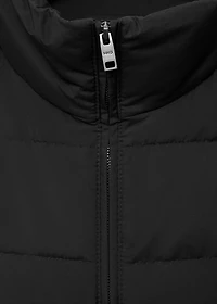 Quilted vest with down and feather filling