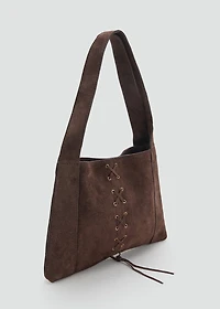 Leather bag with cord detail