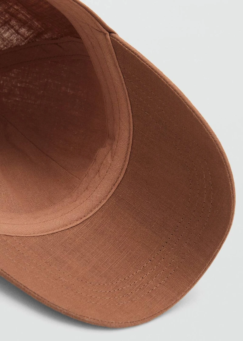 Linen-blend cap with embroidered message